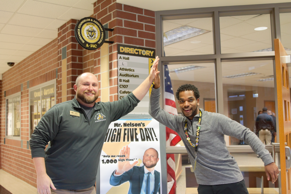 Guidance Counselor Mr. Cook Pranks Assistant Principal Mr. Nelson with ‘High Five Day!’